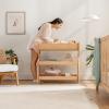 imageComfy Cubs Baby Changing Table  Sturdy Wood Construction Timeless Look Baby Change Table with Two Open Shelves for Infant Daycare Essentials Storage  Natural Wood with White LegsNatural Wood
