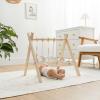 imageComfy Cubs Wooden Baby Play Gym  Natural Finish Pinewood Baby Activity Gym with 5 Sensory Hanging Toys  Easy NoTool Assembly Safe and Durable for Infant Motor and Visual Development  Natural WoodWhite and Wood