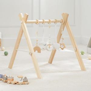 imageComfy Cubs Wooden Baby Play Gym  Natural Finish Pinewood Baby Activity Gym with 5 Sensory Hanging Toys  Easy NoTool Assembly Safe and Durable for Infant Motor and Visual Development  Natural WoodWhite and Wood